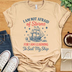 T-Shirt Soft Cream / S Little Women Quote Shirt – I Am Not Afraid of Storms
