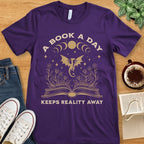 T-Shirt Team Purple / S A Book A Day Keeps Reality Away T-shirt